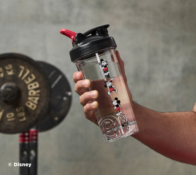 pro-series-h6 Mickey_Mouse_Protein_Shaker_Bottle_Being_Held_In_the_Gym.jpg
